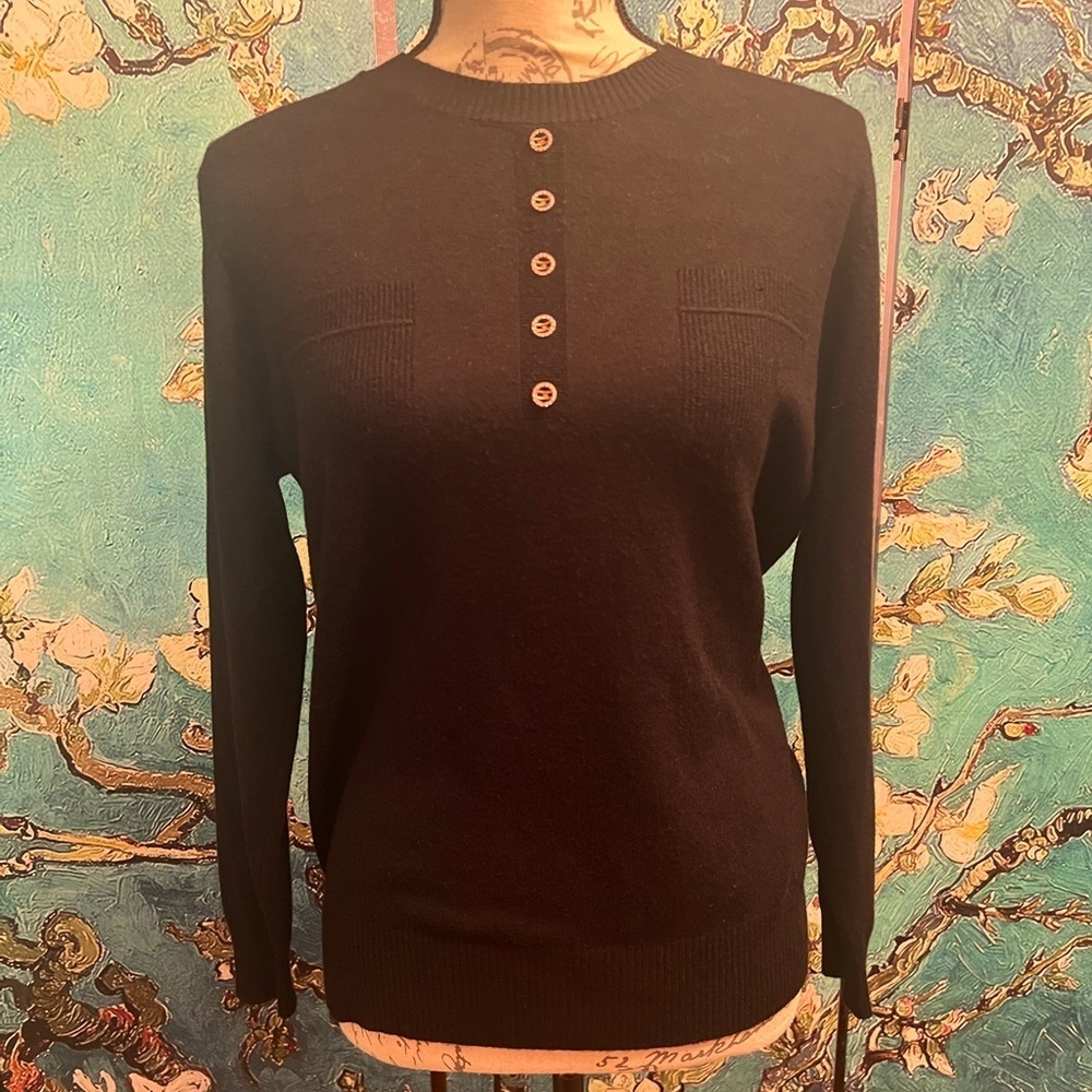 Soft, jem embellished five button sweater, with faux front pocket stitching.